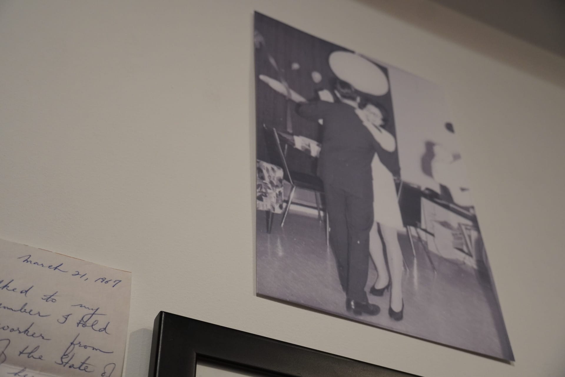Bernie and Albert dancing photo hanging on wall